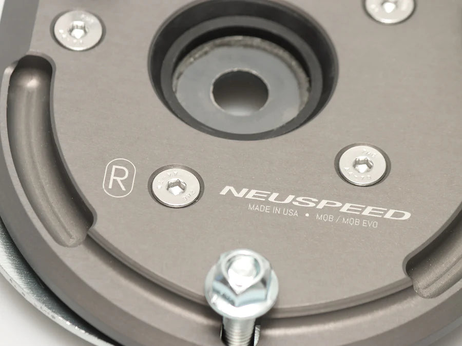 Super close-up of NEUSPEED Billet BiAXIS Front Upper Strut Mount designed for MQB/MQBe vehicles